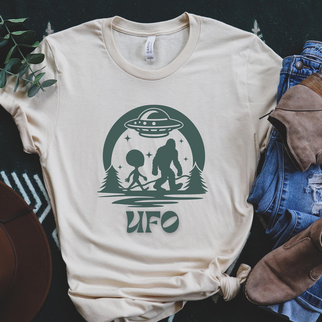 UFO Adventure Unisex Tee: Quirky Alien & Bigfoot Graphic Shirt,